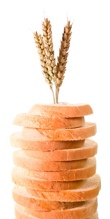 Bread and cereal ears on a white background.の写真素材