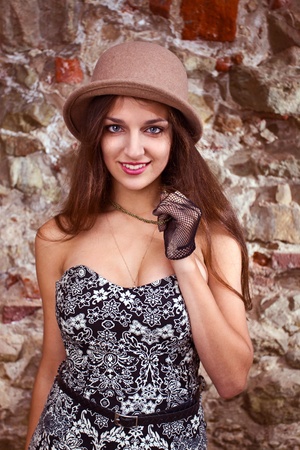 young beautiful woman in old city.