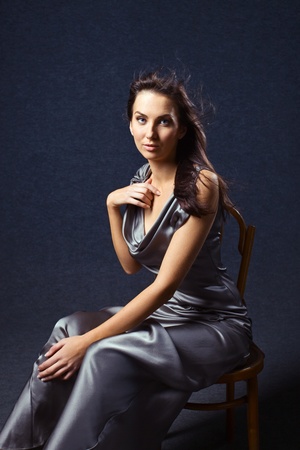 young woman in grey evening dress, professional make-up.の写真素材