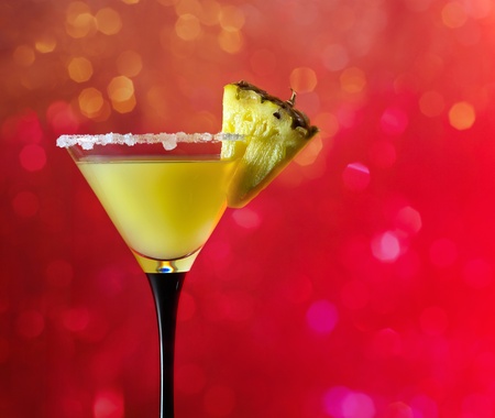 glass with  cocktail on a red background.の写真素材