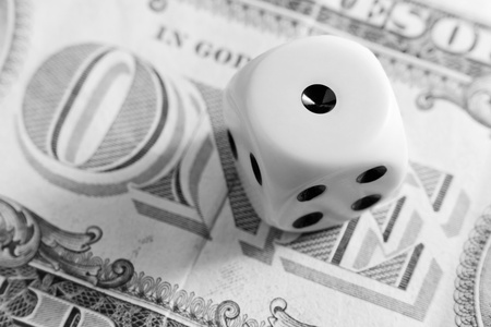 cube for dicing on a banknote.