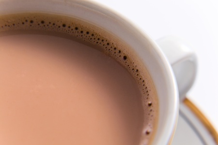 Chocolate milk in white mug, macro shot.の写真素材