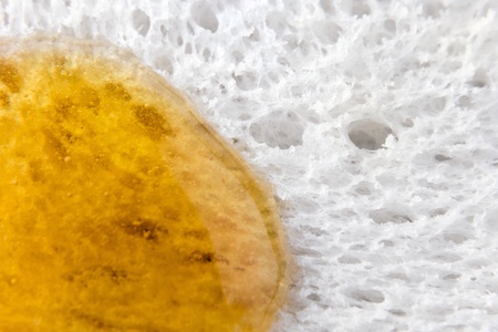 honey on a bread , focus on a center.の写真素材