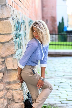 young blond  woman in striped  blouse.の写真素材
