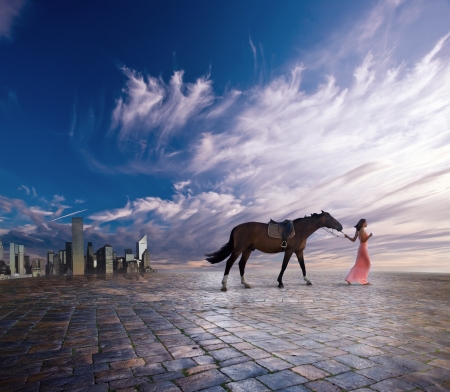 The young woman with a horse leave a cityの写真素材