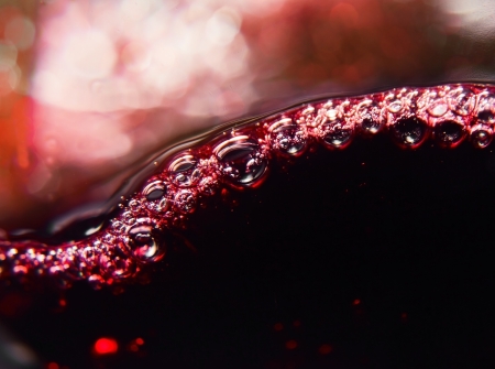 Red wine on a black background, abstract splashing.
の写真素材