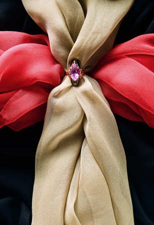 Gold ring with amethyst on a black fabricの写真素材