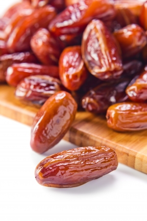 Dried dates isolated on a white backgroundの写真素材