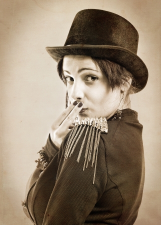 The actress of a cabaret imitates Charlie Chaplin,sepiaの写真素材