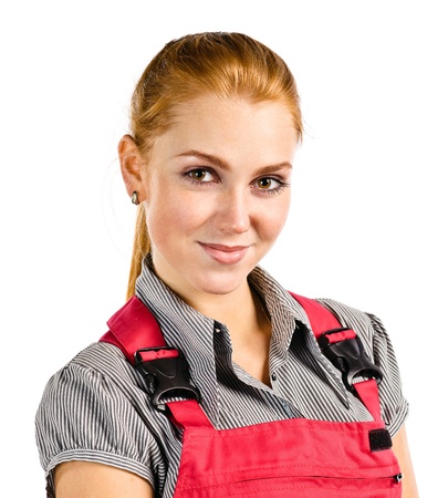 Young happy woman in red overalls , isolated on whiteの写真素材