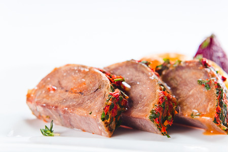 Stewed mutton with spices on a white plateの写真素材