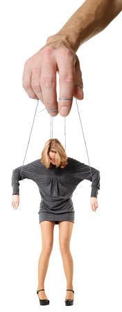 Man's hand operating the woman , isolated on whiteの写真素材