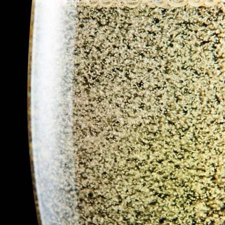 champagne in wineglass on a black background Saved clipping path の写真素材