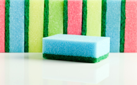 Sponges for washing  on  white reflective 