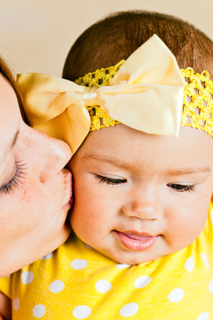 Happy young mum with the babyの写真素材