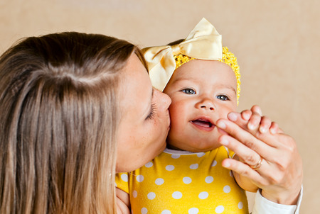 Happy young mum with the babyの写真素材