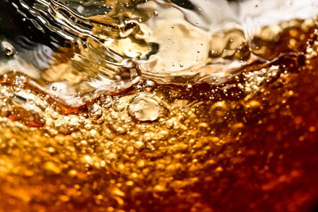 detail of an alcoholic beverage on black backgroundの写真素材