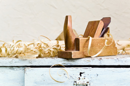 old wooden plane in a workshop of the carpenter