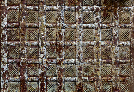 Fragment of a medieval metal door の写真素材