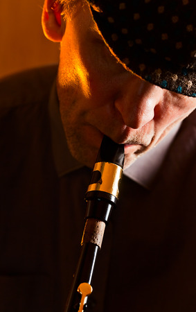 Portrait of the man playing a saxophoneの写真素材