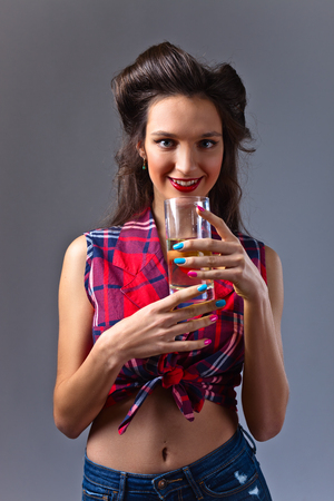 young beautiful woman with juiceの写真素材