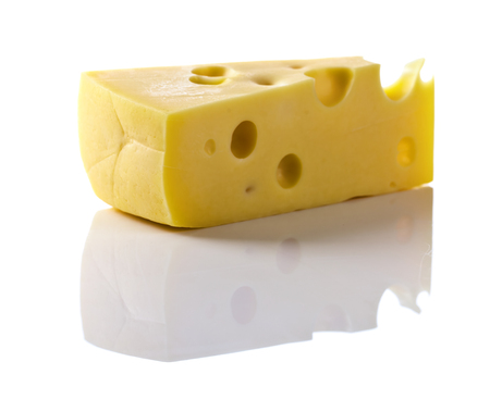 maasdam cheese isolated on a white backgroundの写真素材