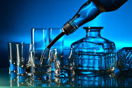 vodka in bar on a glass tableの写真素材