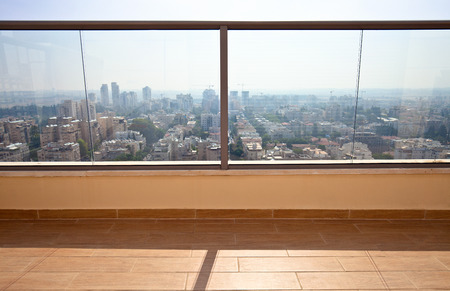 High end balcony in downtown of modern cityの写真素材