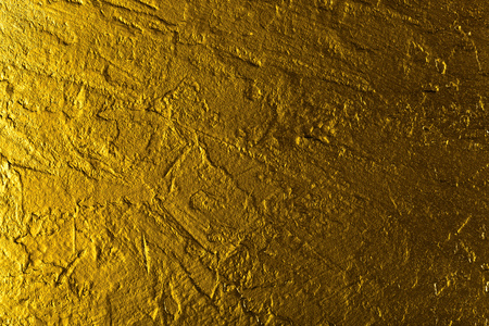 gold texture background , focus on a centerの写真素材