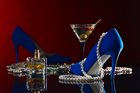 Blue velvet shoes  on a black backgroundの写真素材