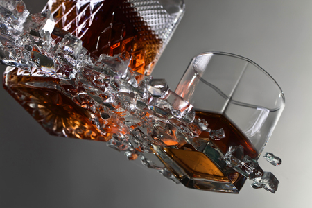 Glass of Whiskey with ice.View from the bottom .の写真素材
