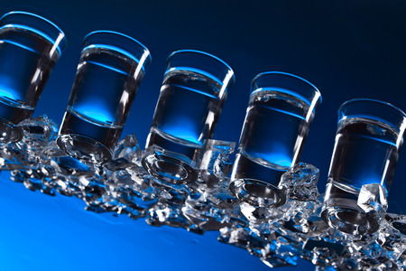 Glasses of vodka with ice. View from the bottom .の写真素材
