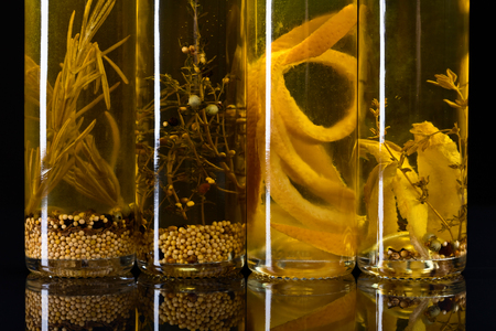 Olive oil with different spices and herbs.の写真素材