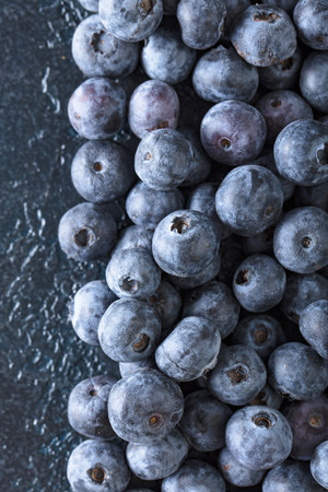  Ripe and juicy fresh picked blueberries closeup. Blueberry background.Top view, copy space.の写真素材