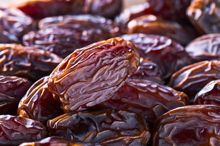 Close-up of juicy ripe dates , selective focusの写真素材