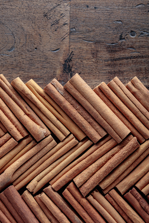 Cinnamon sticks closeup . Top view , copy space .
