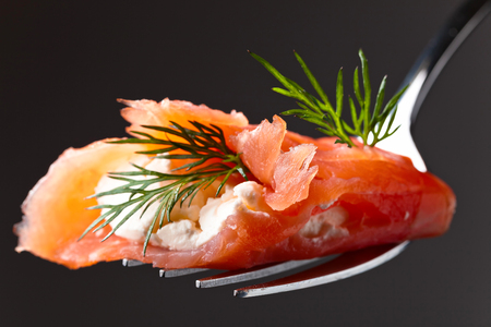 Smoked salmon, cream cheese and dill . Tasty snack. Seafood.の写真素材