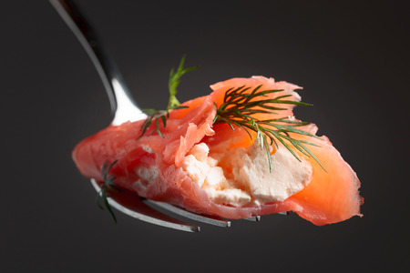 Smoked salmon, cream cheese and dill . Tasty snack. Seafood.の写真素材