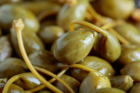 Pickled caper berries . Edible fruits of Capparis . Berries are used as garnish.の写真素材