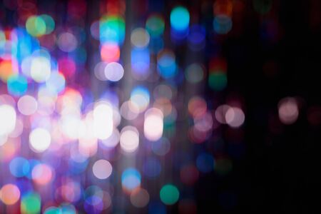 Elegant abstract colorful background with bokeh defocused lights.