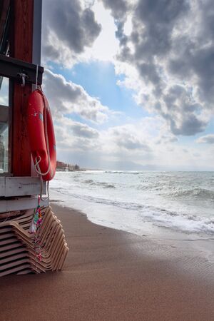 Tropical dark storm clouds over the sea and sandy beach.の写真素材
