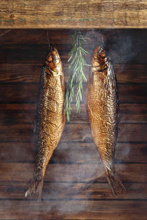 Delicious smoked herring with rosemary.  Traditional food in the Baltic counties.