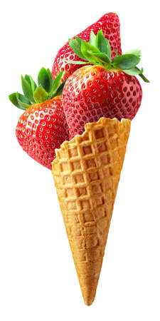 Waffle cone with strawberries isolated on a white background.の写真素材