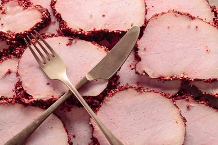 Slices of spicy smoked ham. Top view.