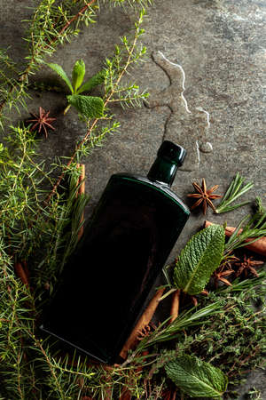 Vintage bottle with balsam or herbal tincture. Top view.の写真素材