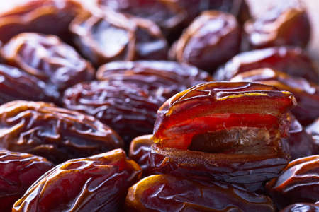 Close-up of juicy ripe dates, selective focus.
