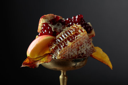 Apple, pomegranate, and honey, are the traditional food for Jewish New Year - Rosh Hashana....