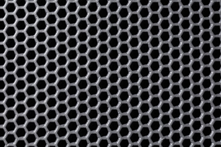 Grey plastic cellular background. Futuristic industrial background.