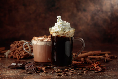 Coffee and hot chocolate with whipped cream sprinkled with chocolate crumbs. Copy space.の写真素材