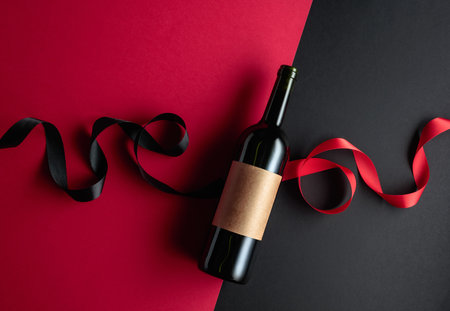 Bottle of red wine with empty label. Top view. Copy space.の写真素材